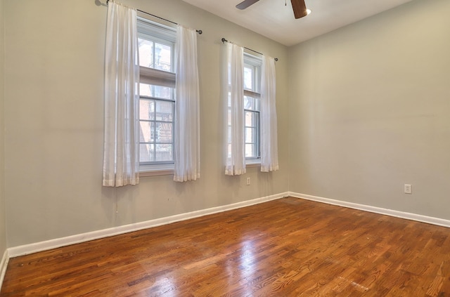 187 Wayne St Unit 208C, Jersey City, NJ 07302 - empty room featuring dark wood-style flooring and ceiling fan