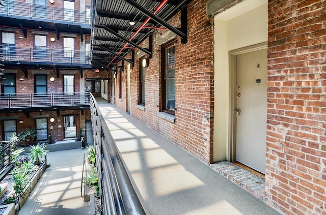 187 Wayne St Unit 208C, Jersey City, NJ 07302 - view of exterior entry featuring brick siding
