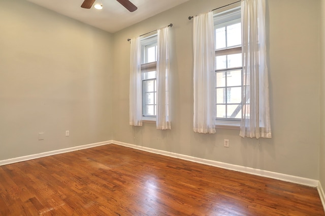 187 Wayne St Unit 208C, Jersey City, NJ 07302 - empty room with a ceiling fan and dark wood-type flooring