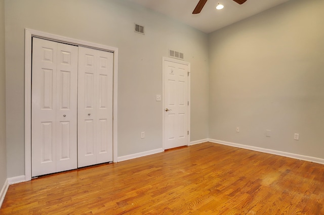 187 Wayne St Unit 208C, Jersey City, NJ 07302 - unfurnished bedroom with light wood finished floors, a closet, a ceiling fan, and recessed lighting