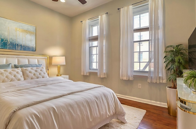187 Wayne St Unit 208C, Jersey City, NJ 07302 - bedroom featuring multiple windows and wood finished floors