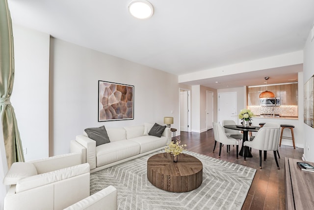 living room with hardwood / wood-style flooring