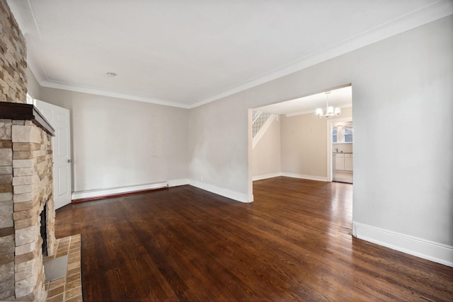 unfurnished living room with a baseboard heating unit, ornamental molding, dark hardwood / wood-style floors, and a notable chandelier