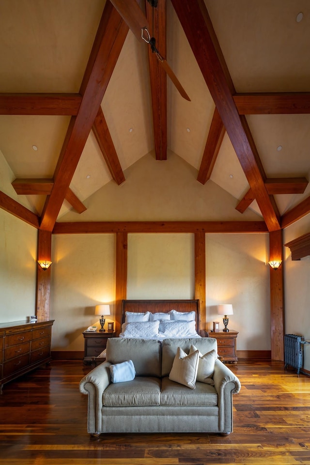 bedroom with vaulted ceiling and dark hardwood / wood-style flooring