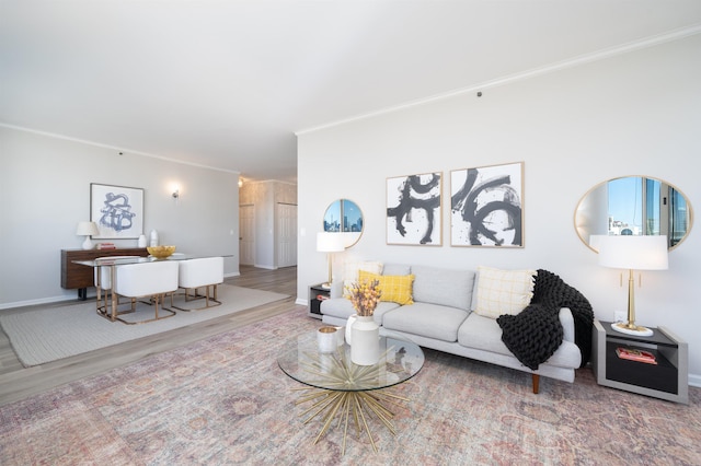20 2nd St Unit 2503, Jersey City, NJ 07302 - living room featuring baseboards, wood finished floors, and ornamental molding