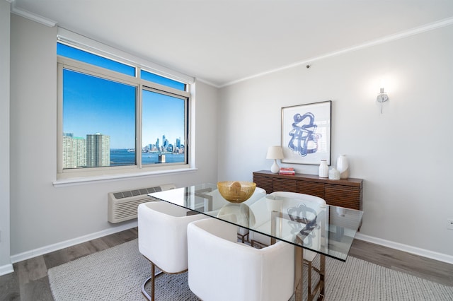 20 2nd St Unit 2503, Jersey City, NJ 07302 - dining room with wood finished floors, crown molding, baseboards, and an AC wall unit