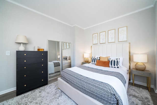 20 2nd St Unit 2503, Jersey City, NJ 07302 - bedroom with ornamental molding, baseboards, and wood finished floors