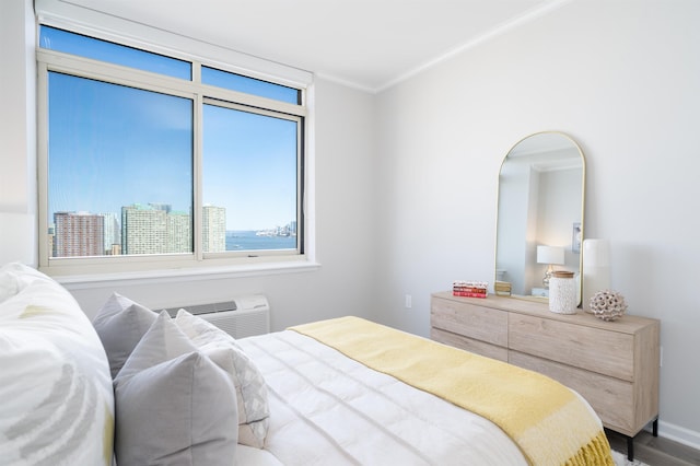 20 2nd St Unit 2503, Jersey City, NJ 07302 - bedroom with crown molding, multiple windows, and an AC wall unit