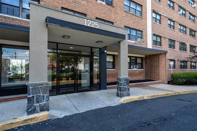 entrance to property with brick siding