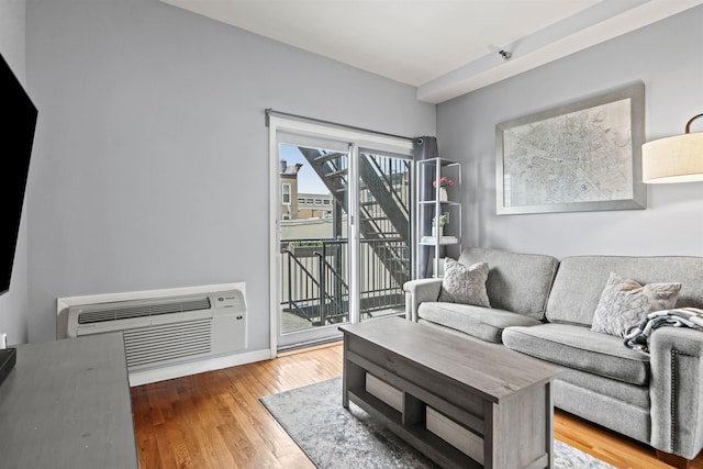 403 Monroe St Unit 3L, Hoboken, NJ 07030 - living area with wood finished floors and a wall mounted air conditioner