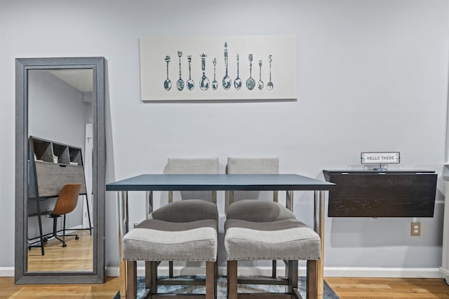 403 Monroe St Unit 3L, Hoboken, NJ 07030 - dining room with baseboards and wood finished floors