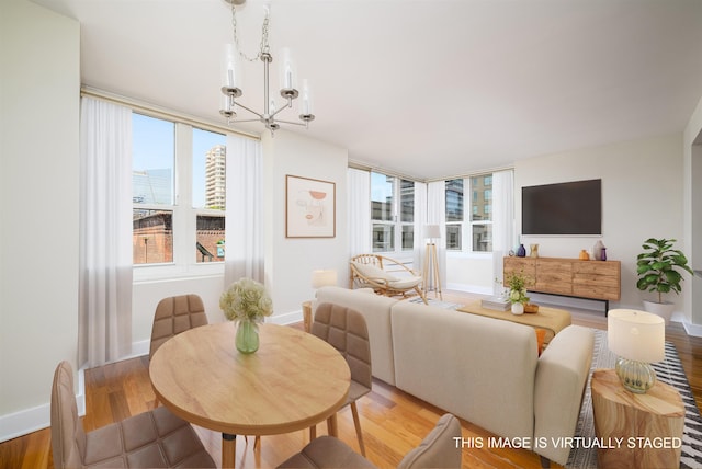 88 Morgan St Unit 802, Jersey City, NJ 07302 - living room featuring a chandelier and wood finished floors