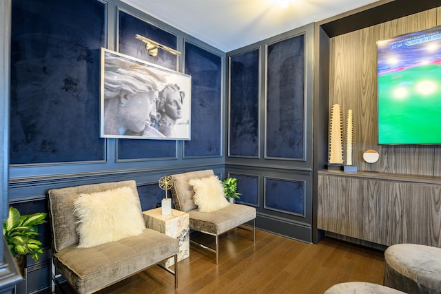88 Morgan St Unit 802, Jersey City, NJ 07302 - sitting room featuring wood finished floors and a decorative wall