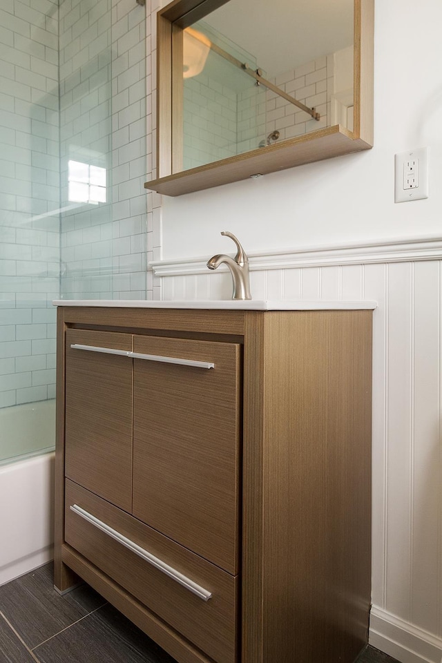 385 1st St, Jersey City, NJ 07302 - full bath featuring combined bath / shower with glass door and a wainscoted wall
