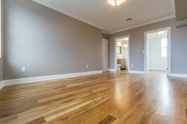 385 1st St, Jersey City, NJ 07302 - empty room with light wood-type flooring, baseboards, and crown molding