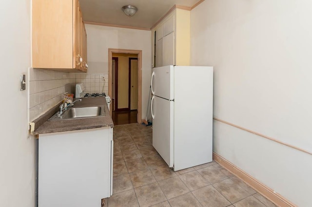 101 Kensington Ave Unit A5, Jersey City, NJ 07306 - kitchen with white appliances, a sink, tasteful backsplash, and light tile patterned floors