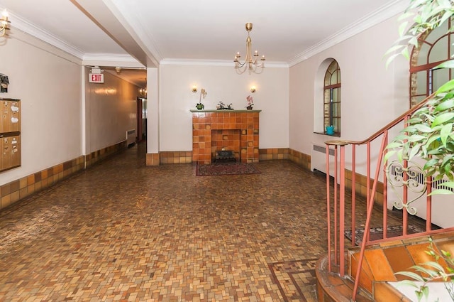 interior space featuring radiator heating unit, crown molding, and a chandelier