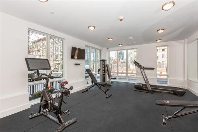 exercise room with baseboards