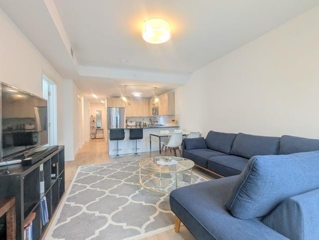 living room featuring light wood-style flooring