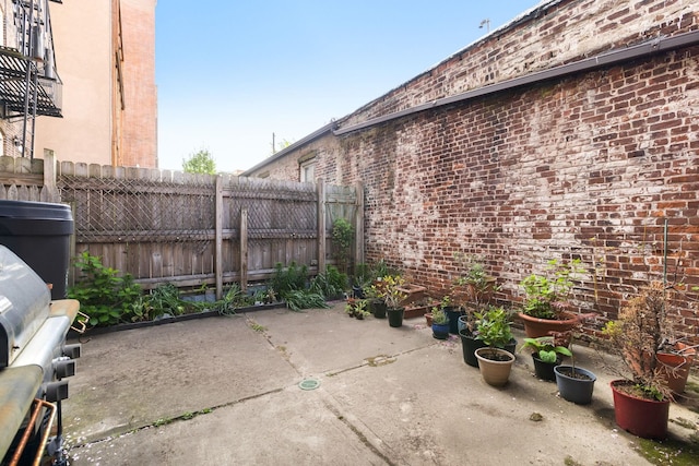 50 Bright Street 1L Or 101, Jersey City, NJ 07302 - view of patio / terrace featuring fence