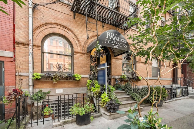 227 Bay St Unit 4B, Jersey City, NJ 07302 - doorway to property with brick siding