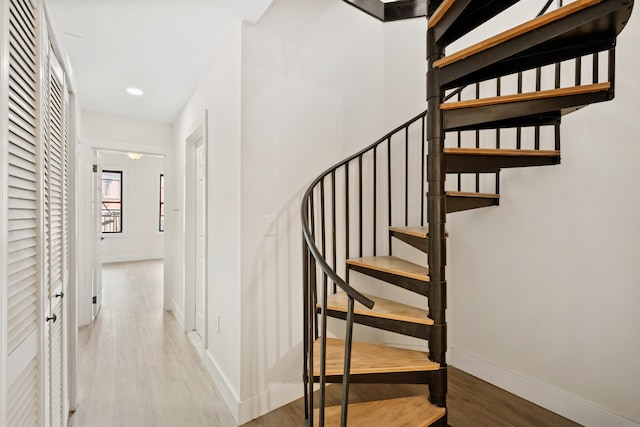 227 Bay St Unit 4B, Jersey City, NJ 07302 - staircase featuring wood finished floors and recessed lighting