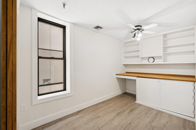 227 Bay St Unit 4B, Jersey City, NJ 07302 - unfurnished office with built in study area, light wood-style flooring, and a ceiling fan