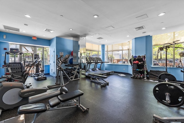 exercise room with recessed lighting and visible vents