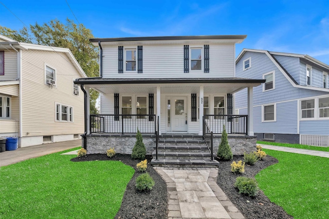 view of front of property with a front lawn