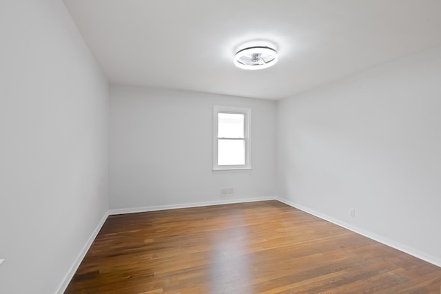 64 W 57th St, Bayonne, NJ 07002 - unfurnished room featuring wood finished floors
