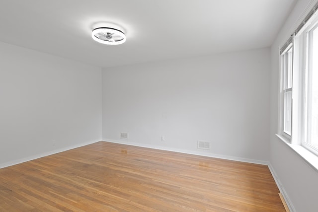 64 W 57th St, Bayonne, NJ 07002 - spare room featuring light wood-style floors