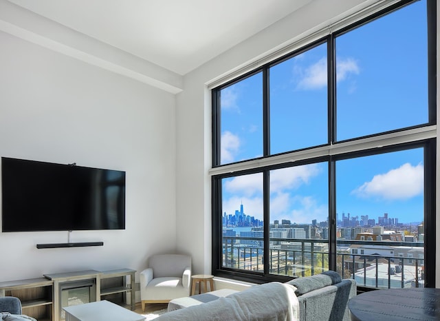 living area with a wealth of natural light and a city view