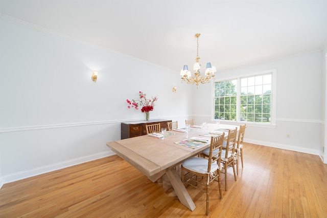 57 Terrace Ave, West Orange, NJ 07052 - dining room with a chandelier, light wood-style floors, baseboards, and crown molding