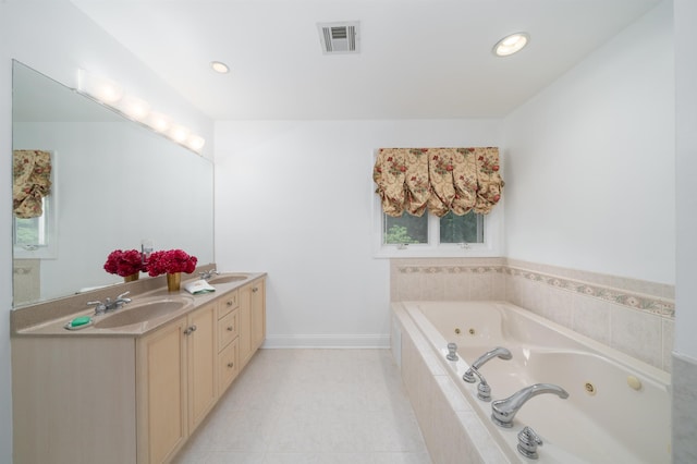 57 Terrace Ave, West Orange, NJ 07052 - bathroom featuring double vanity, a whirlpool tub, tile patterned floors, and recessed lighting
