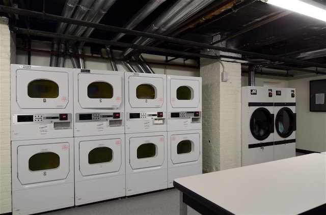 clothes washing area featuring stacked washer / drying machine and separate washer and dryer