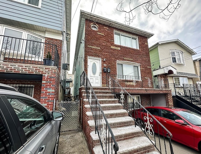multi unit property featuring brick siding
