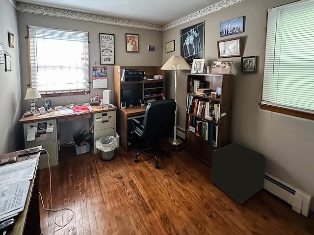 home office featuring a baseboard radiator and wood finished floors