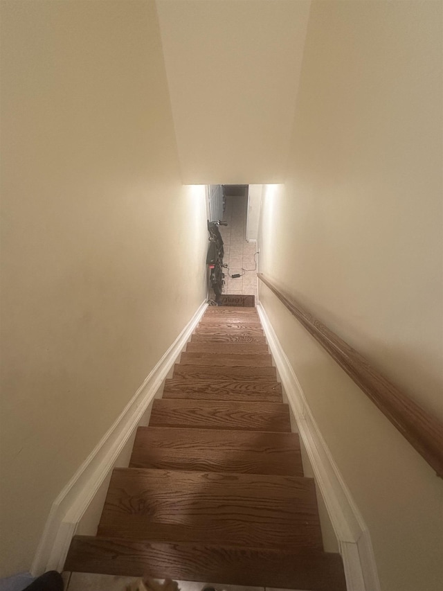 10 Clendenny Ave, Jersey City, NJ 07304 - stairs with baseboards and wood finished floors