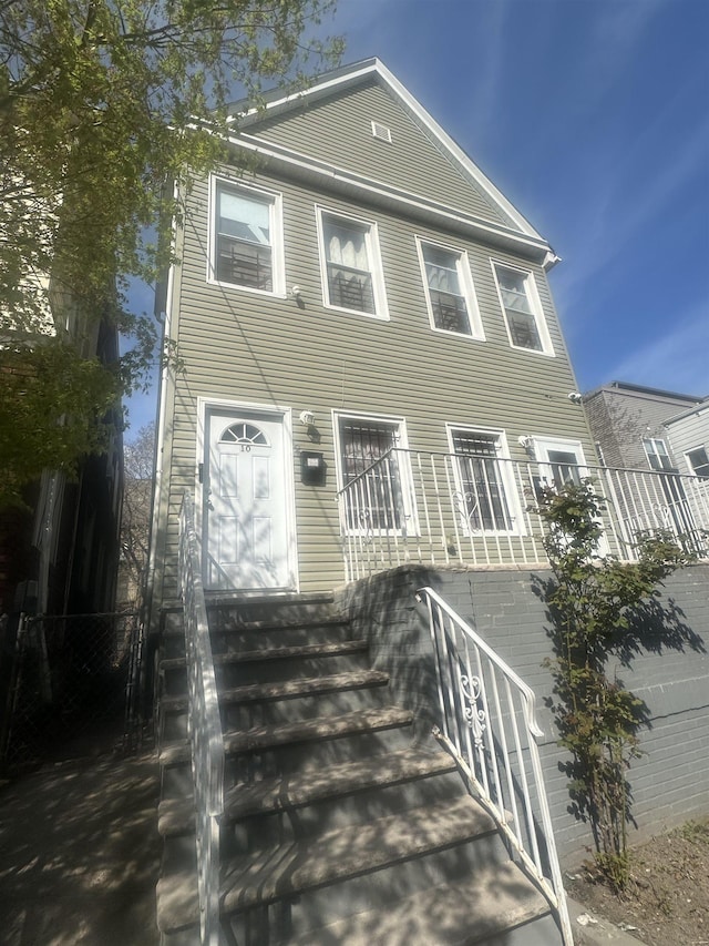 10 Clendenny Ave, Jersey City, NJ 07304 - view of front facade with fence and entry steps