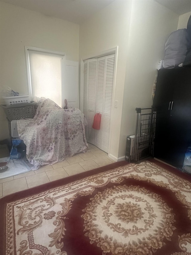 10 Clendenny Ave, Jersey City, NJ 07304 - bedroom with light tile patterned floors and a closet