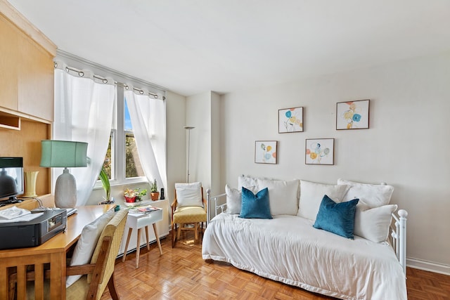 bedroom featuring light parquet flooring