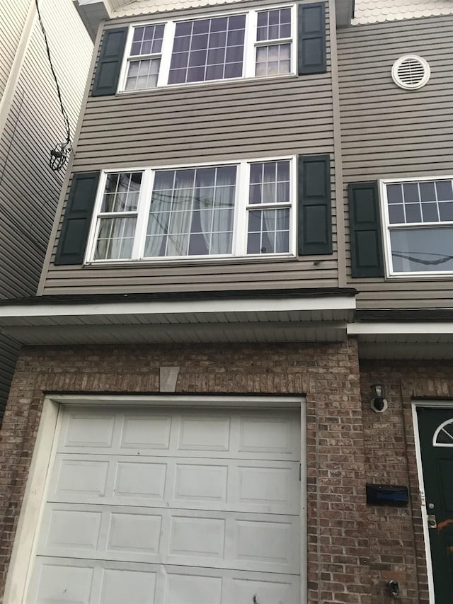 view of home's exterior featuring a garage