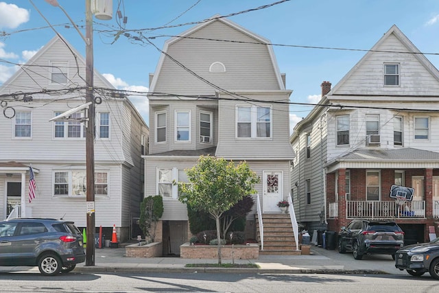 103 Kennedy Blvd, Bayonne, NJ 07002 - townhome / multi-family property with a gambrel roof