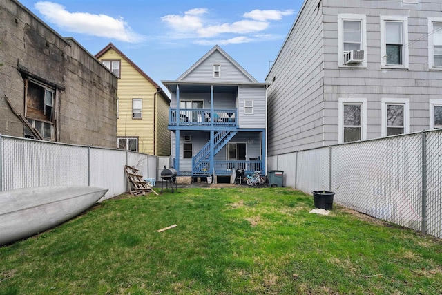 119 W 19th St, Bayonne, NJ 07002 - back of property with a fenced backyard, stairway, and cooling unit