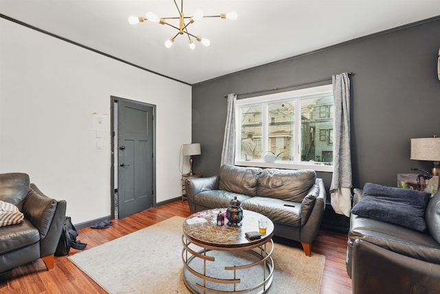 119 W 19th St, Bayonne, NJ 07002 - living room with a chandelier and wood finished floors