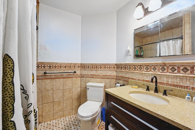 119 W 19th St, Bayonne, NJ 07002 - bathroom with vanity, a wainscoted wall, a shower with curtain, and tile walls