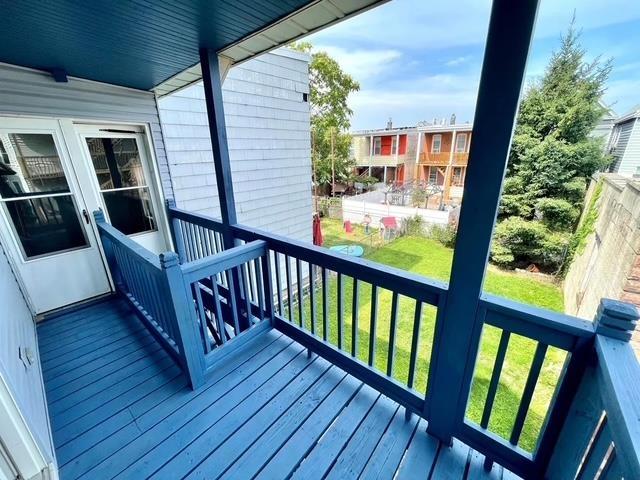 119 W 19th St, Bayonne, NJ 07002 - wooden terrace with a lawn
