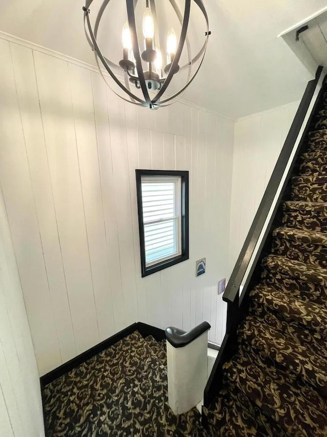 119 W 19th St, Bayonne, NJ 07002 - detailed view of a chandelier and carpet flooring
