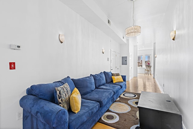 231 Grand St Unit 5R, Hoboken, NJ 07030 - living room featuring light wood finished floors and electric panel