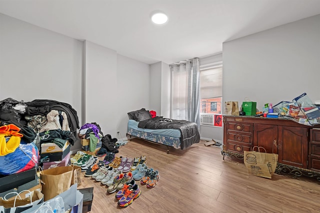 bedroom with light hardwood / wood-style flooring